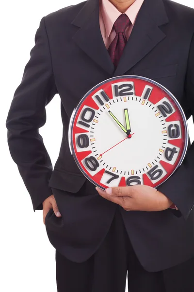 Businessman holding a clock — Stock Photo, Image