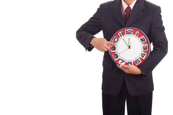 Businessman holding a clock — Stock Photo, Image