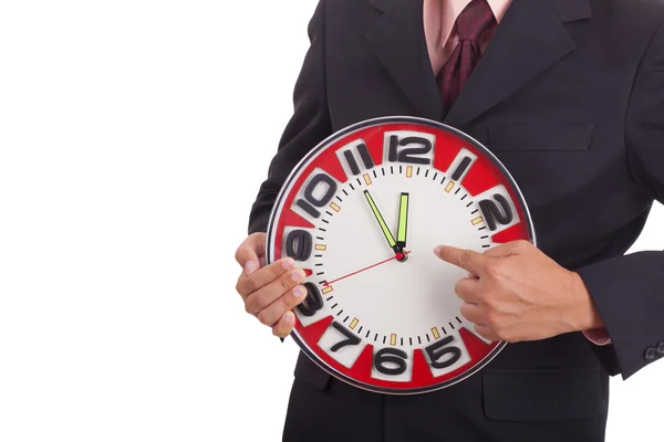 Businessman holding a clock — Stock Photo, Image