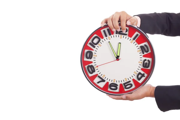 Businessman holding a clock — Stock Photo, Image