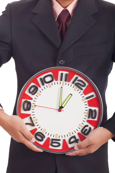 Businessman holding a clock — Stock Photo, Image