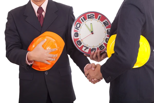 Construction engineers shake hands — Stock Photo, Image