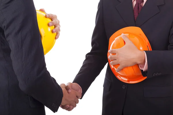 Construction engineers shake hands — Stock Photo, Image
