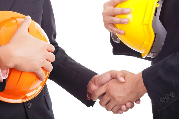 Construction engineers shake hands — Stock Photo, Image