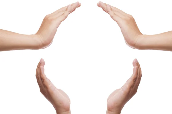 Чотири руки ізольовані на білому створили простір для копіювання посередині — стокове фото