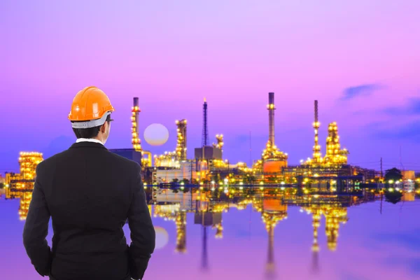 Construction engineer looking on the oil refinery — Stock Photo, Image