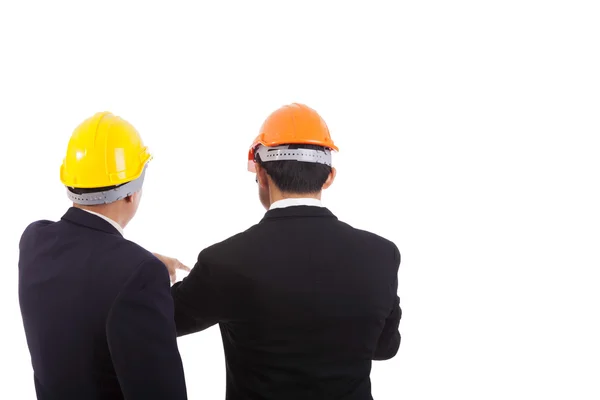 Construction engineers with helmets on heads — Stock Photo, Image