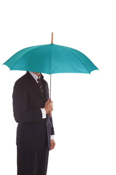 Businessman standing under an umbrella — Stock Photo, Image