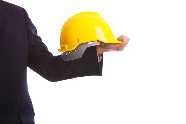 Engenheiro de construção segurando um chapéu amarelo duro — Fotografia de Stock