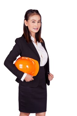 turuncu bir kask elinde tutan mühendisi kadın