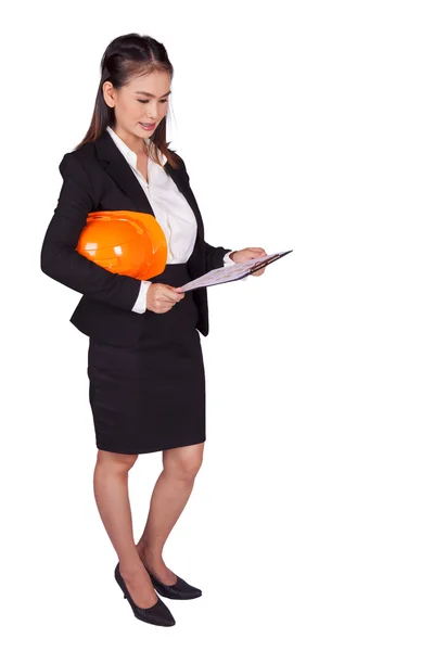 Female engineer holding an orange hard hat and a folder with documents — Stock Photo, Image