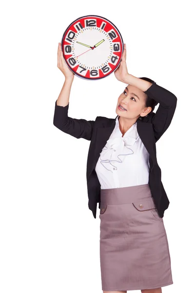 Sosteniendo un gran reloj rojo — Foto de Stock