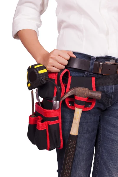 Female engineer standing with tools on the belt — Stock Photo, Image