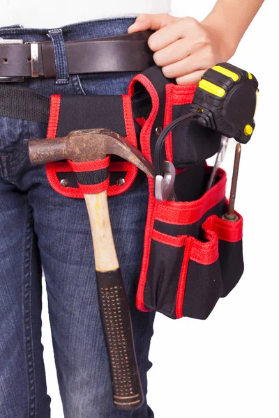 Female engineer standing with tools on the belt — Stock Photo, Image