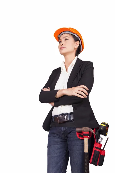 Female engineer with tools is crossing her arms over her chest — Stock Photo, Image