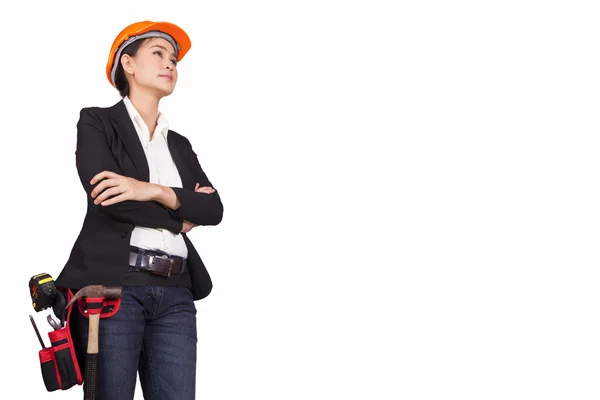 Female engineer with tools is crossing her arms over her chest — Stock Photo, Image