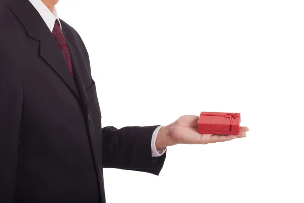 Businessman holding a gift box — Stock Photo, Image