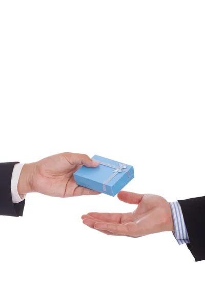 Business gifts.businessman giving a gift to another businessman — Stock Photo, Image