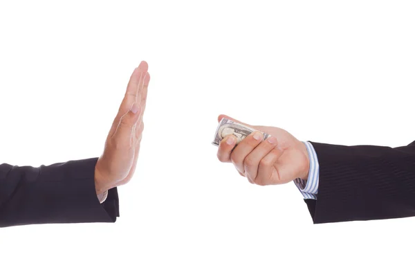 Businessman offering a bribe to another businessman — Stock Photo, Image