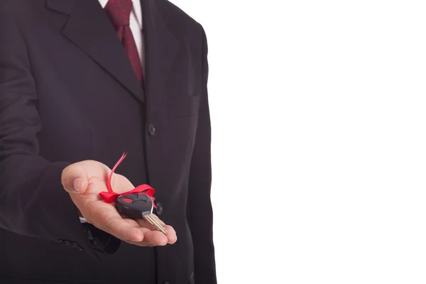 Businessman holding car keys — Stock Photo, Image