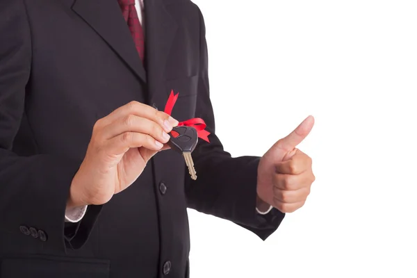 Businessman holding car keys — Stock Photo, Image