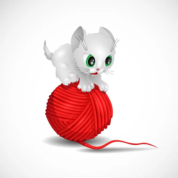 Kitten playing with a ball of yarn — Stock Photo, Image