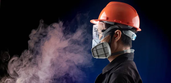 man worker wearing full protection equipments to work duty in the risk atmosphere such as hazard chemical gas or smoke or dust or pm2.5