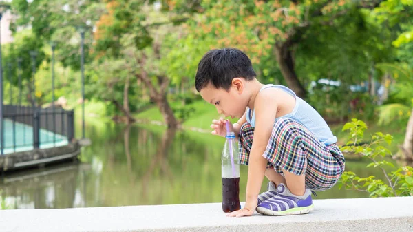 Asian Boy Drinking Soft Drink Soda Bottle Excessive Consumption Sugar — Stock Photo, Image