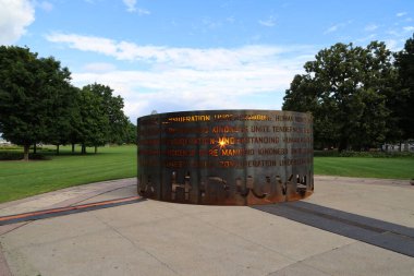 The sculpture representing humanity in Majors Hill Park in Ottawa. High quality photo