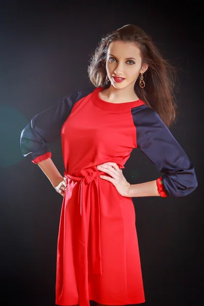 Young girl on a black background — Stock Photo, Image