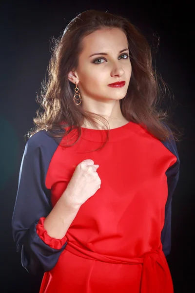 Young girl on a black background — Stock Photo, Image