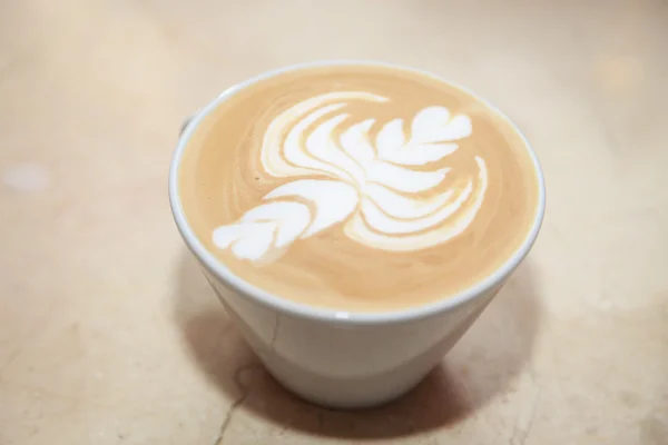 Hot coffee and white cup on table — Stock Photo, Image