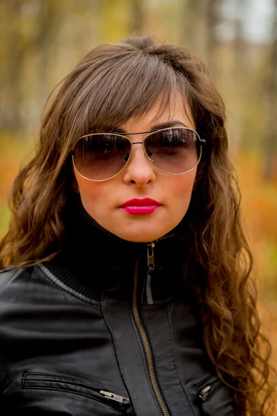 Smiling girl in sunglasses Royalty Free Stock Images