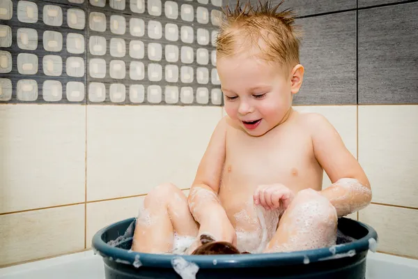 Little boy is bathed in the tub — Stock Photo, Image