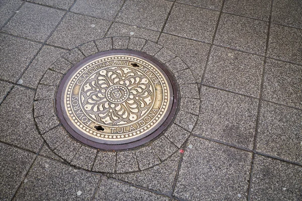 Round steel sewer manhole — Stock Photo, Image