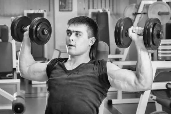 Man exercising with dumbbells — Stock Photo, Image