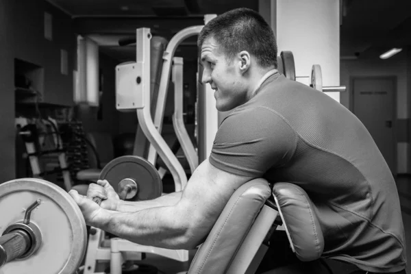 Man  with athletic barbell — Stock Photo, Image