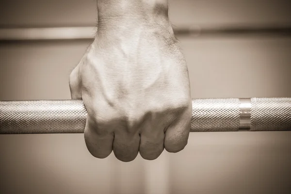 Hand on the training bar — Stock Photo, Image