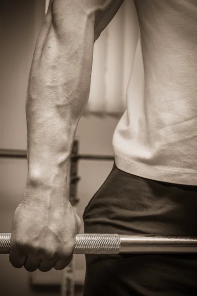 Hand on the training bar — Stock Photo, Image