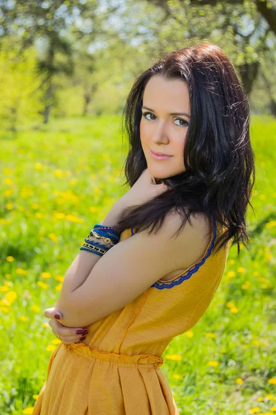 Brunette in the garden — Stock Photo, Image