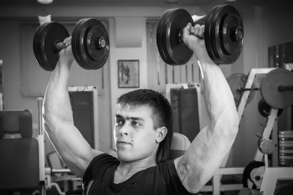 Man exercising with dumbbells — Stock Photo, Image