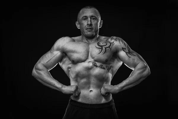 Muscle man with tattoos Royalty Free Stock Photos