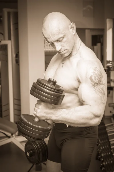 Man exercising with dumbbells — Stock Photo, Image