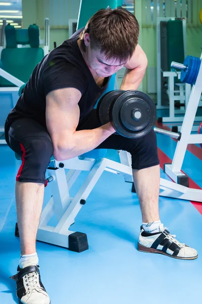 Man working with dumbbells — Stock Photo, Image