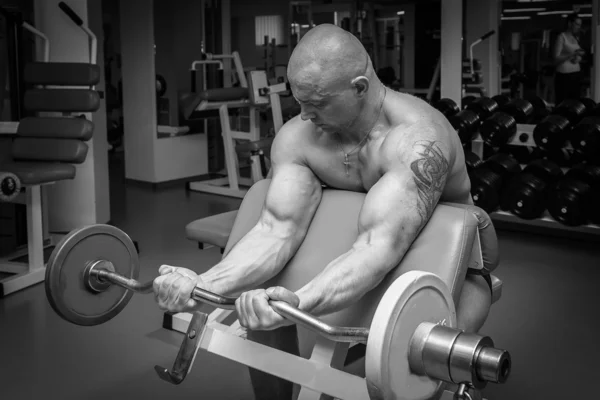 Man  with athletic barbell — Stock Photo, Image