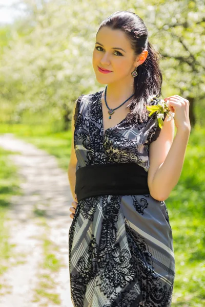 Woman on spring background — Stock Photo, Image