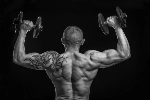 Hombre con mancuernas —  Fotos de Stock