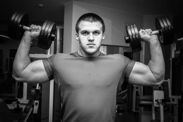 Man exercising with dumbbells — Stock Photo, Image