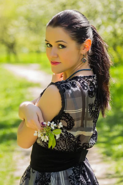 Woman on spring background — Stock Photo, Image