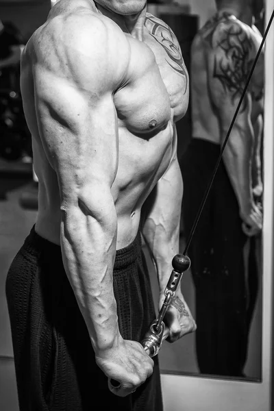 Man  in tattoo  in the gym — Stock Photo, Image